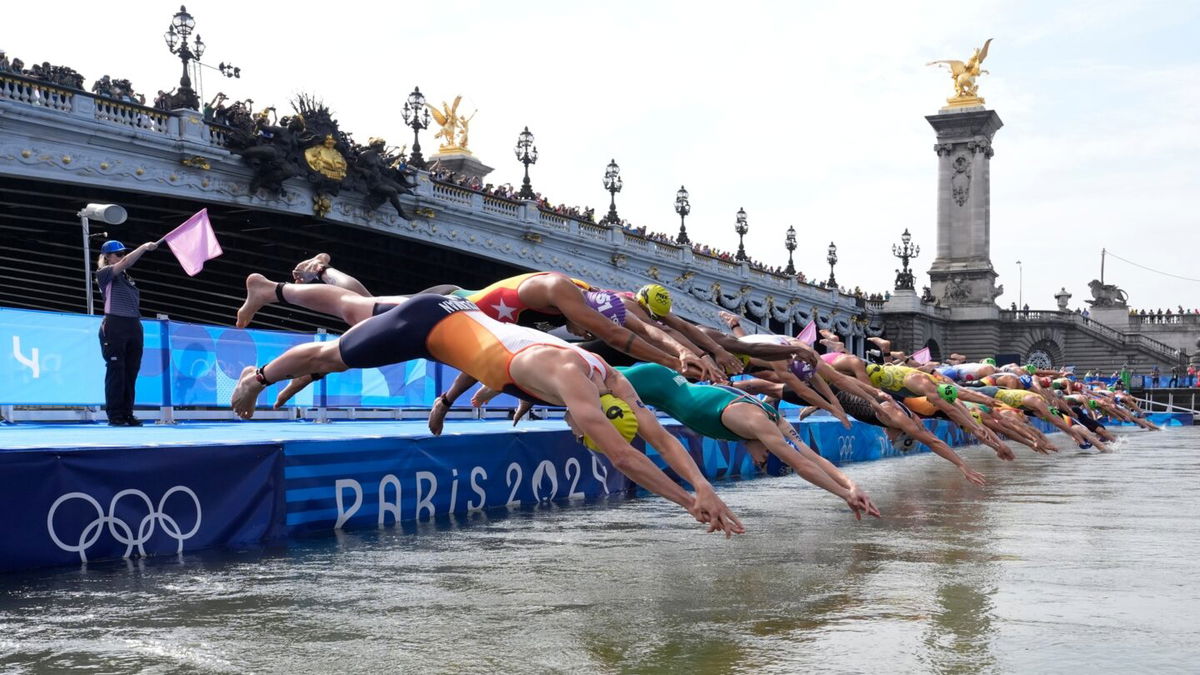 The Paris 2024 men's triathlon begins with a swim in the River Seine