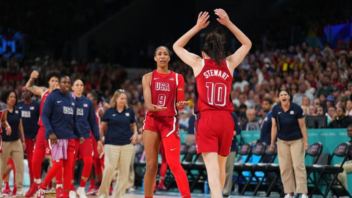 A'ja Wilson and Breanna Stewart high-five during U.S. game