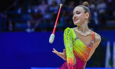 Darja Varfolomeev performs during the clubs competition in the 2024 Rhythmic Gymnastics FIG World Cup Finals.