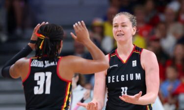 Emma Meesseman and Maxuella Lisowa Mbaka celebrate vs. Japan