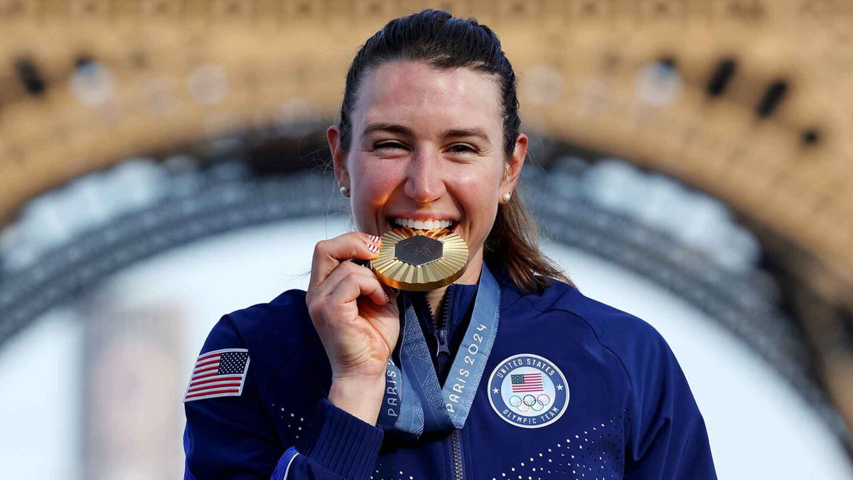 Kristen Faulkner posed with her gold medal