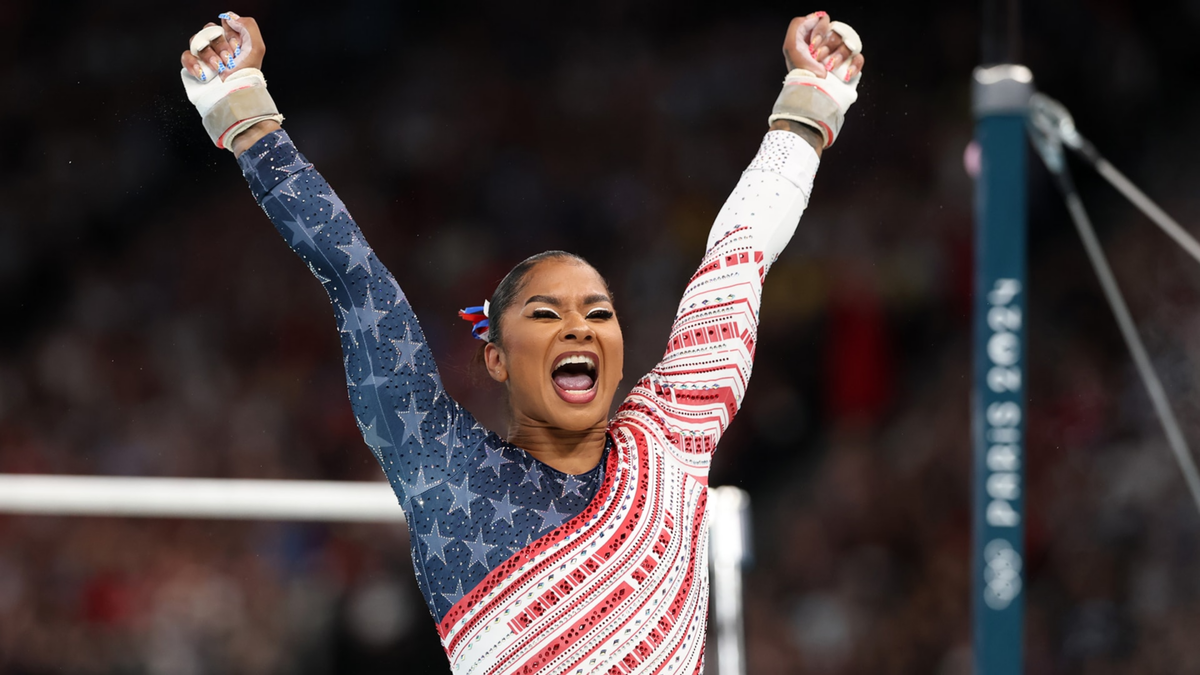 Jordan Chiles celebrates after her bar routine during the team final at the 2024 Paris Olympics