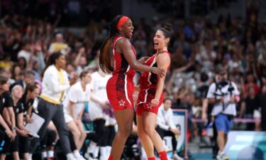 Jackie Young and Kelsey Plum celebrate vs. Germany