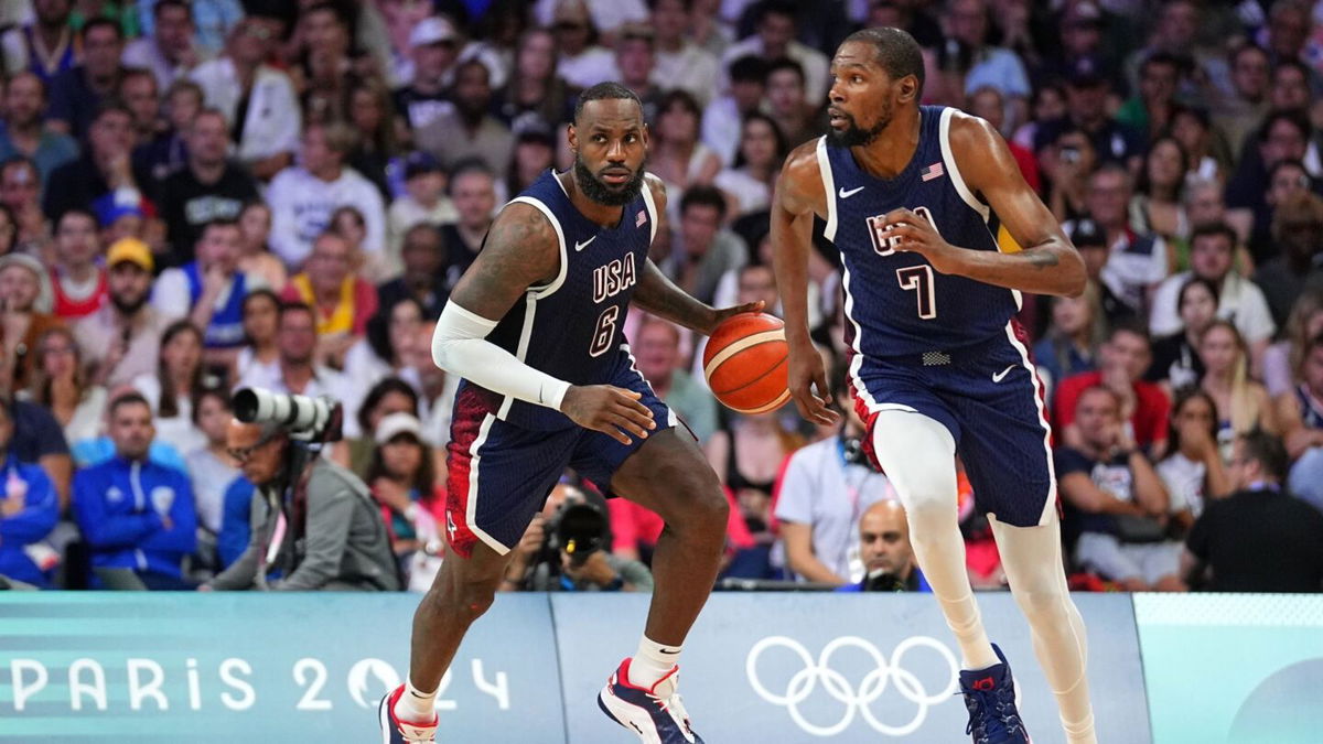 Kevin Durant and LeBron James run up court vs. Serbia