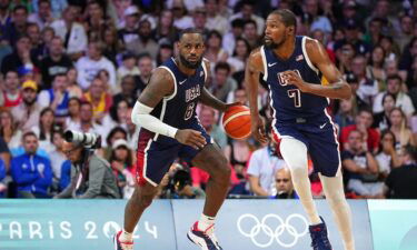 Kevin Durant and LeBron James run up court vs. Serbia