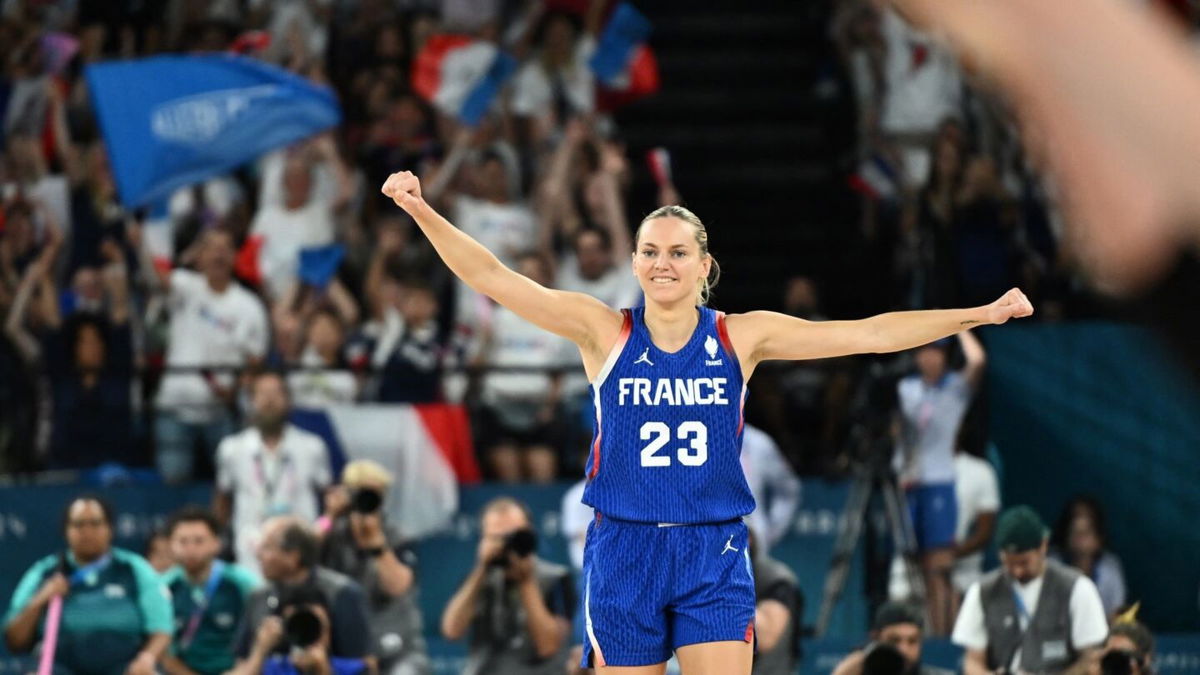 Marine Johannes celebrates basket vs. Germany