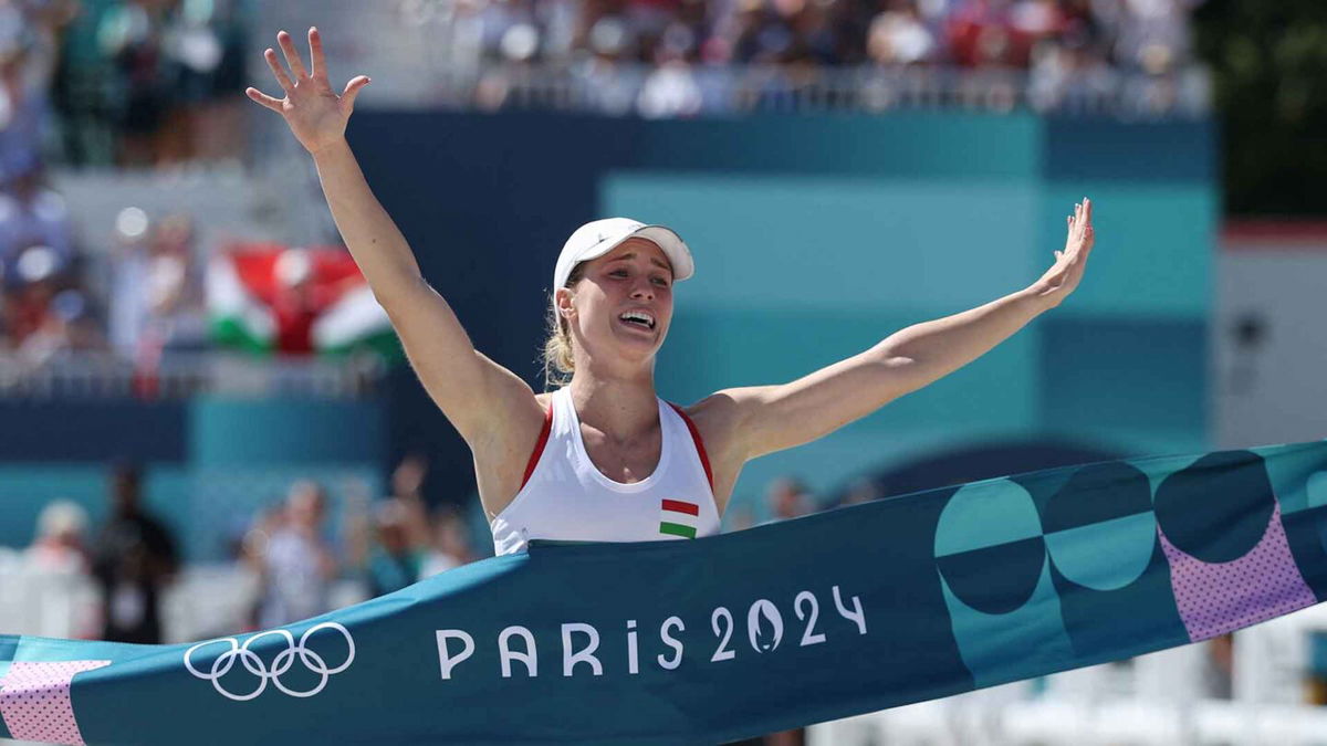 Michelle Gulyas celebrates winning the women's modern pentathlon.