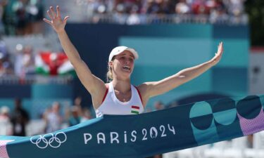 Michelle Gulyas celebrates winning the women's modern pentathlon.