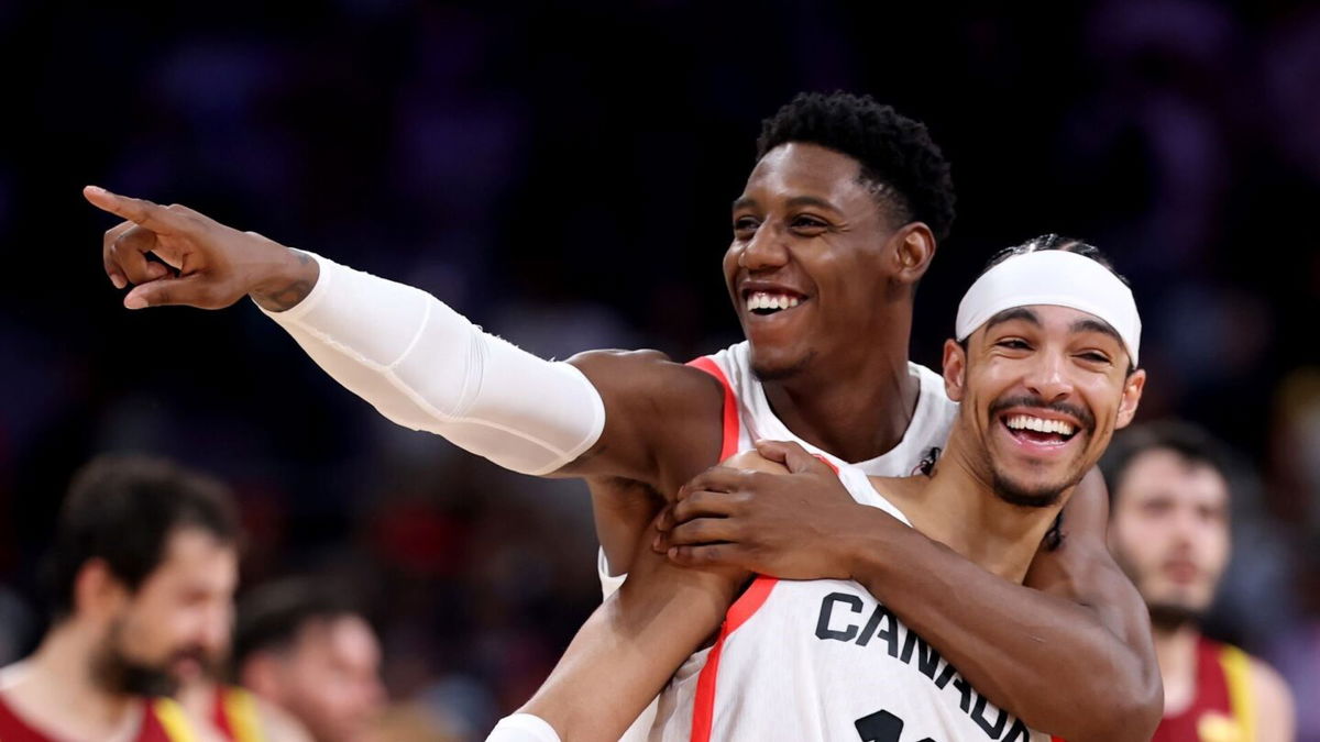 RJ Barrett and Andrew Nembhard celebrate vs. Spain