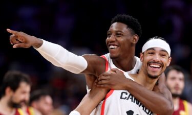 RJ Barrett and Andrew Nembhard celebrate vs. Spain