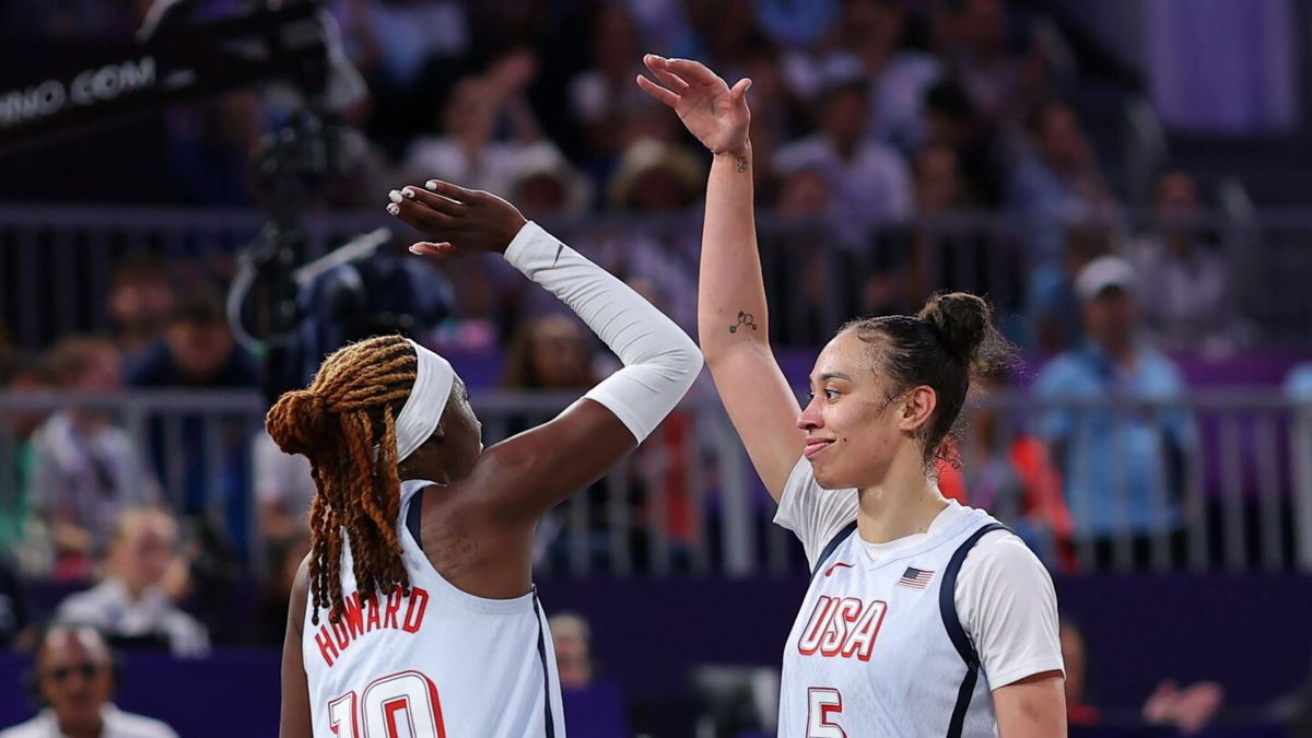 Rhyne Howard and Dearica Hamby high-five vs. China