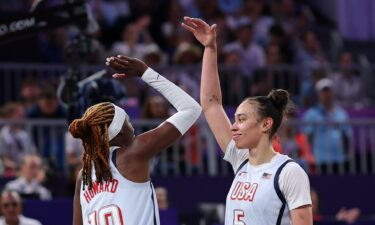 Rhyne Howard and Dearica Hamby high-five vs. China