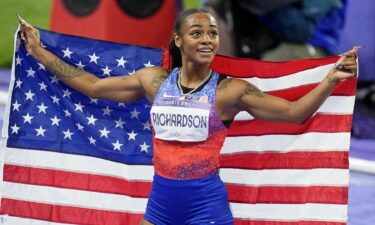 Sha'Carri Richardson celebrates after winning silver medal