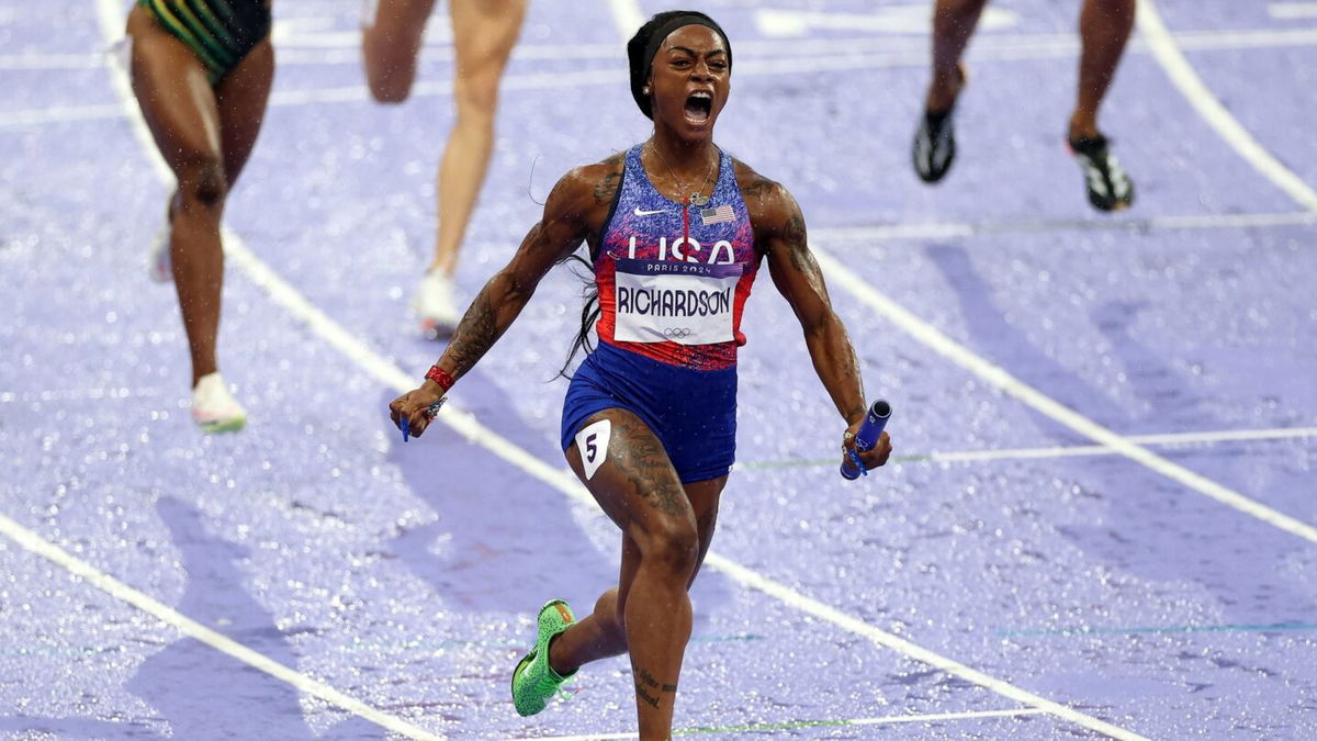 Sha'Carri Richardson celebrates winning the women's 4x100m relay