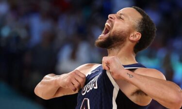 Steph Curry celebrates after made 3 vs. France