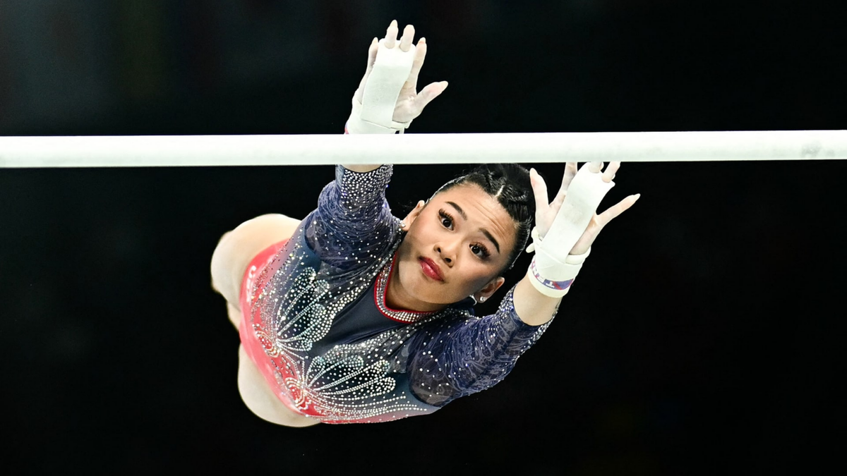 Suni Lee competes on the uneven bars during the women's all around final at the Paris 2024 Olympic Games.