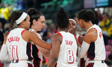 U.S. starting lineup huddles before game vs. Australia