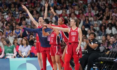 Sabrina Ionescu and the U.S. bench celebrate vs. Germany