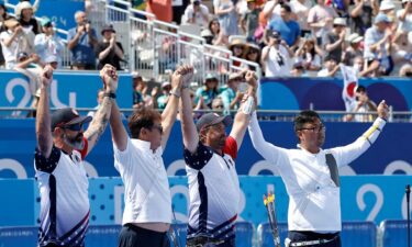 Brady Ellison looks at the crowd after an Olympic archery event