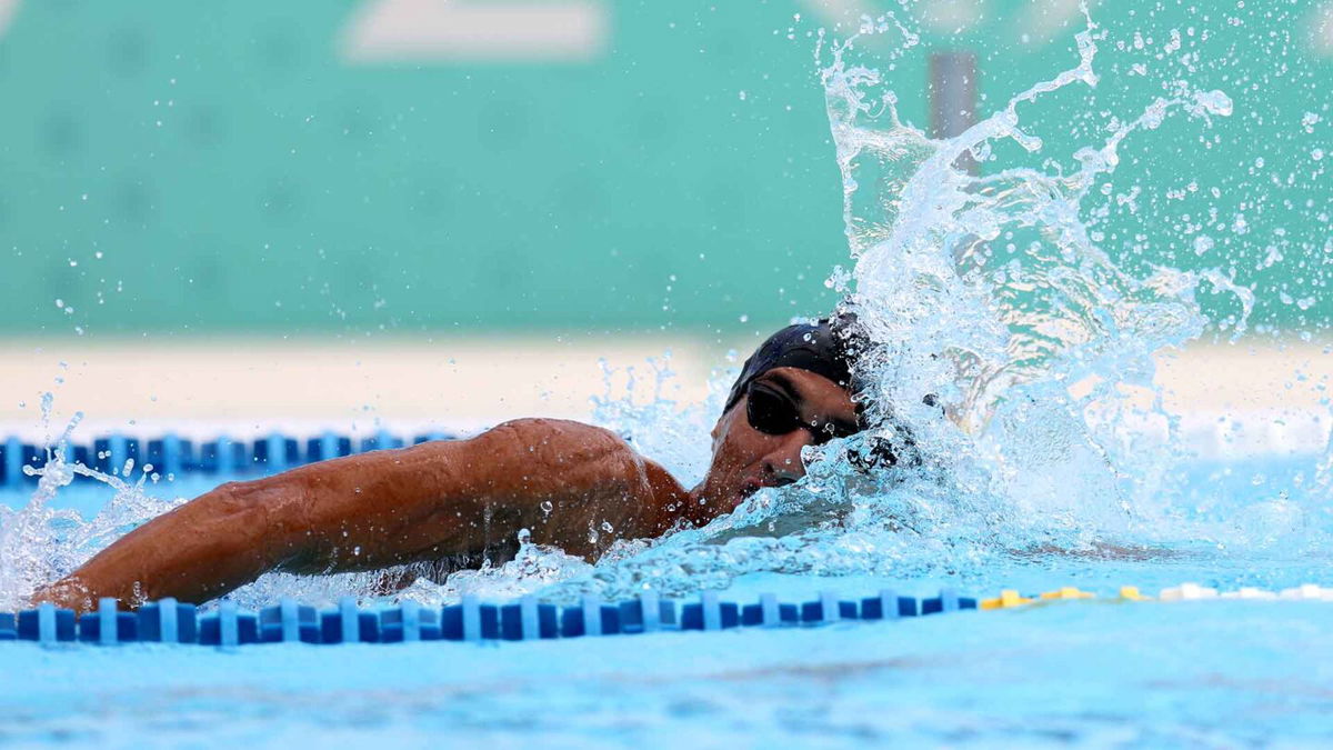 Ahmed Elgendy competes in the swim discipline of the modern pentathlon.