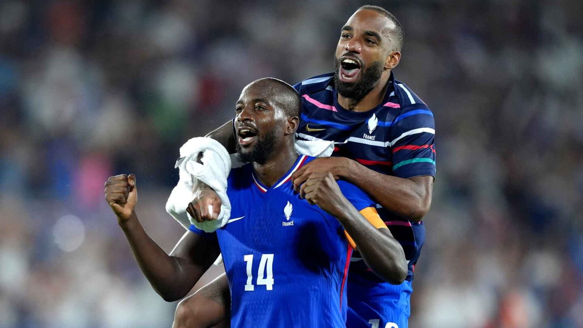 France players celebrate after winning a game.