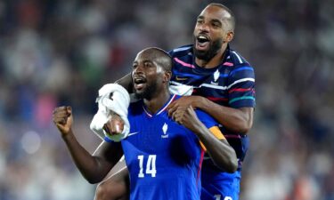 France players celebrate after winning a game.