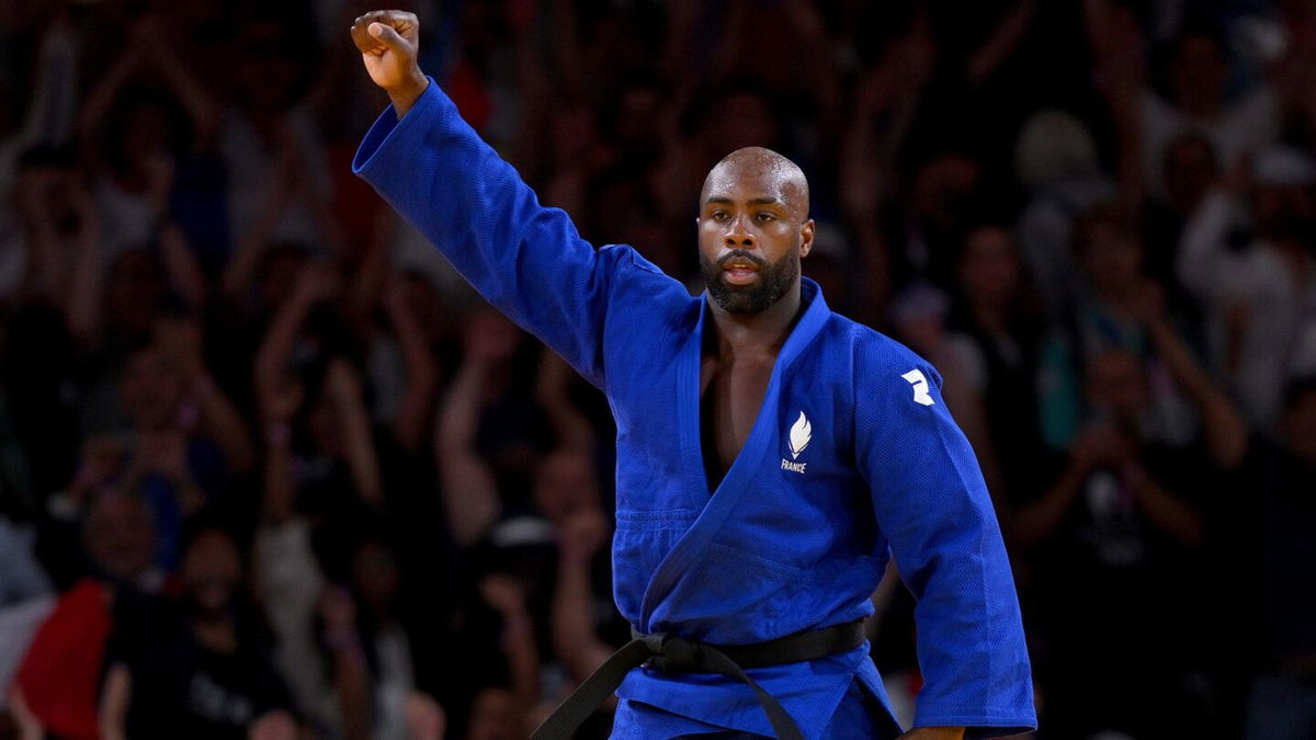 Teddy Riner of Team France reacts during the men's +100kg quarterfinal match against Guram Tushishvili of Team Georgia at the 2024 Paris Olympics.