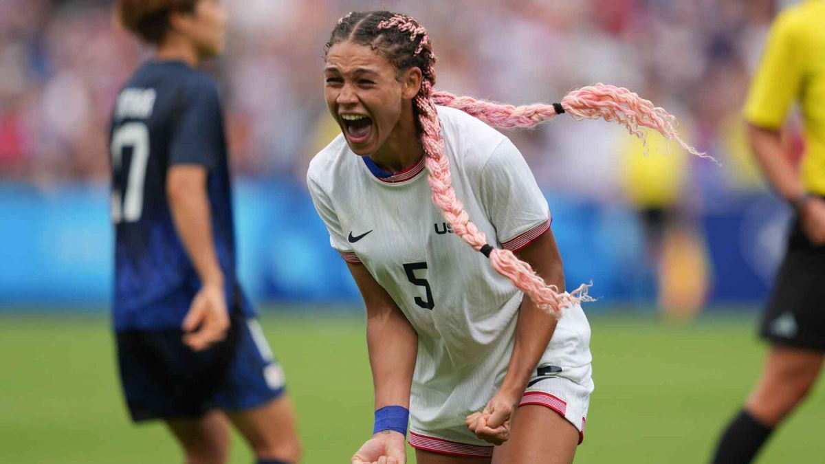 Trinity Rodman celebrates after scoring a goal