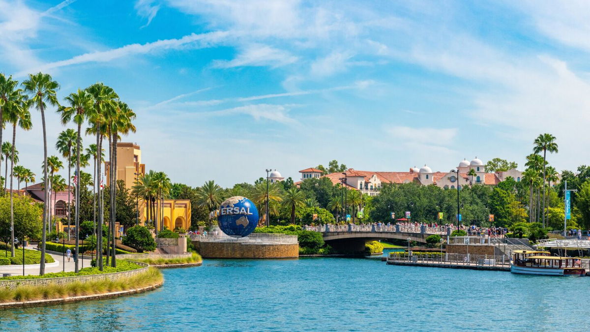 Urban skyline including the logo of Universal Studios.