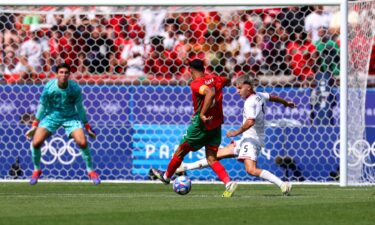 Achraf Hakimi shoots the ball.