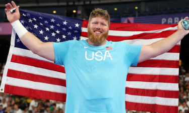 Gold medalist Ryan Crouser celebrates following his third shot put gold medal at Stade de France.