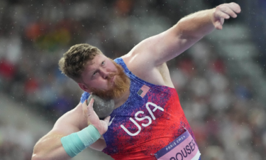 Ryan Crouser competes in the men's shot put final during the Paris Olympic Summer at Stade de France.