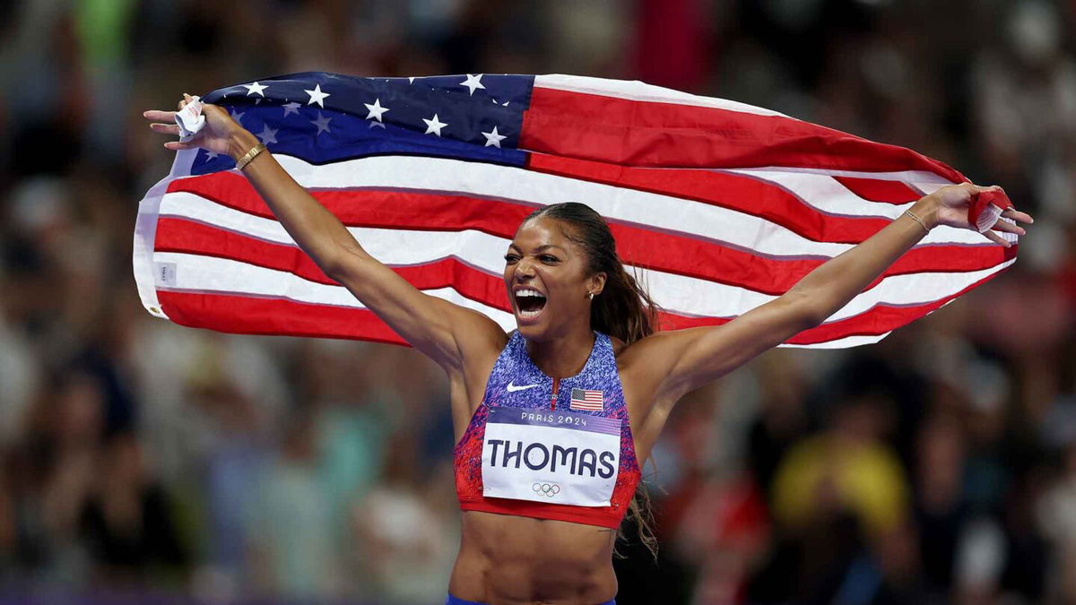 Gold for Gabby Dominant 200m victory ensures Thomas' first Olympic