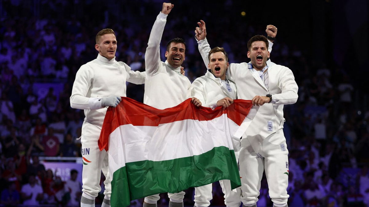 Hungarian men's epee team celebrating