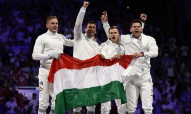 Hungarian men's epee team celebrating