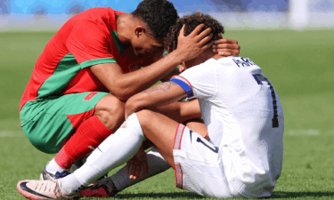 Morocco's Achraf Hakimi consoles a distraught Nathan Harriel of the U.S. after elimination from the 2024 Paris Olympics