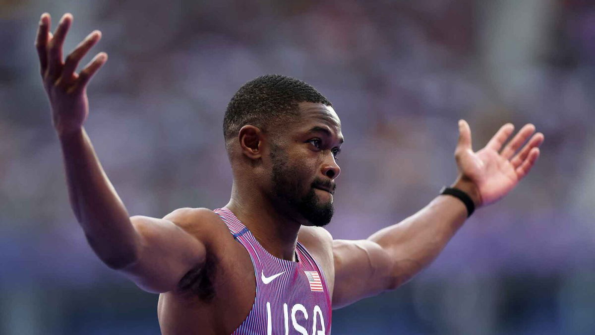 Rai Benjamin reacts after competing in the Men's 400m Hurdles Semi-Final at Stade de France in Paris