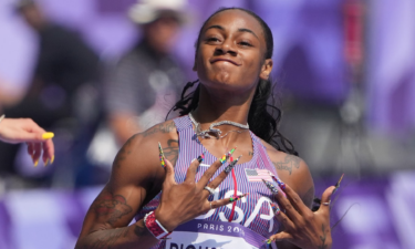 Sha'Carri Richardson wins a women's 100m round 1 race during the Paris Olympic Games at Stade de France.