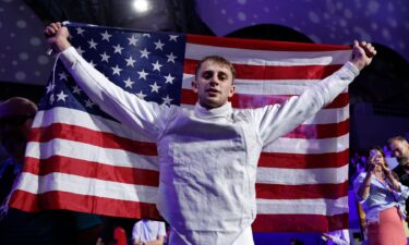 Nick Itkin holding American flag