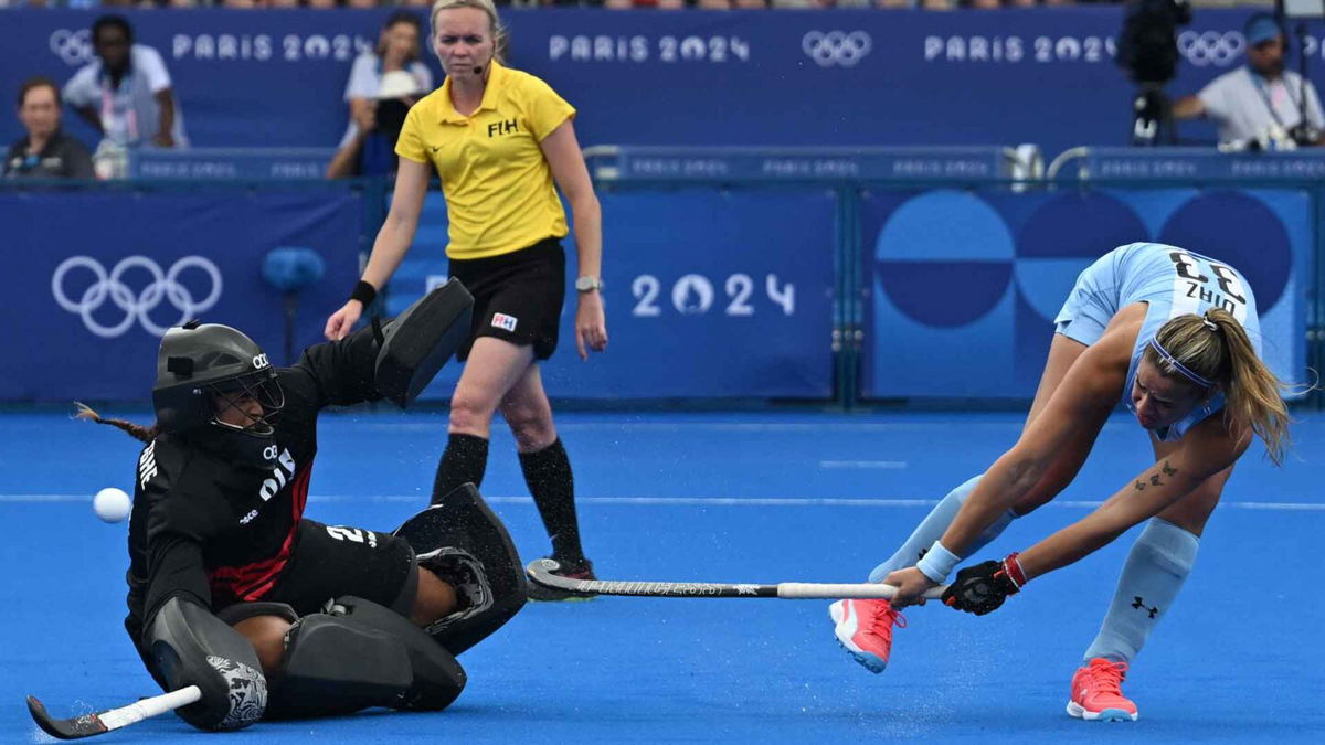 Argentinian forward Zoe Diaz De Armas scores her penalty in the women's bronze medal field hockey match between Argentina and Belgium during the 2024 Paris Olympics at the Yves-du-Manoir Stadium in Colombes on August 9