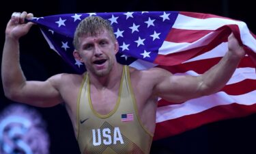 Kyle Douglas Dake of US celebrates winning the final of the men's freestyle -79kg category at the World Wrestling Championships in Budapest