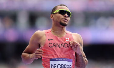 Andre de Grasse of Canada looks on during the first round of the men's 100m on day eight of the Paris Olympics at the Stade de France on August 03