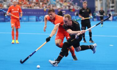 Christopher Ruehr of Team Germany shoots and misses whilst Jorrit Jan Willem Croon of Team Netherlands attempts to block during the Men's Pool A match between Germany and Netherlands on day five of the Olympic Games Paris 2024 at Stade Yves Du Manoir on July 31