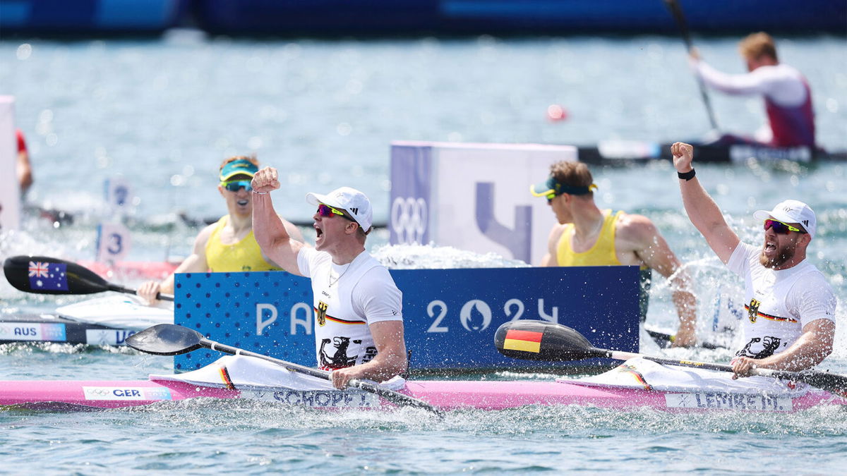 Jacob Schopf and Max Lemke of  Germany celebrate winning gold during the Mens Kayak Double 500m Final