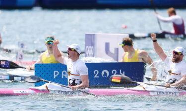 Jacob Schopf and Max Lemke of  Germany celebrate winning gold during the Mens Kayak Double 500m Final