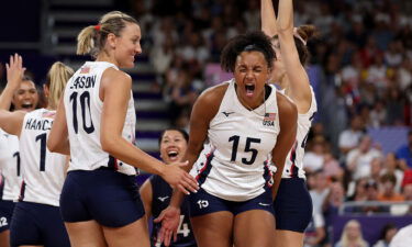 Haleigh Washington of the United States celebrates with team mates during the Women's Preliminary Round - Pool C match between of France and Team USA