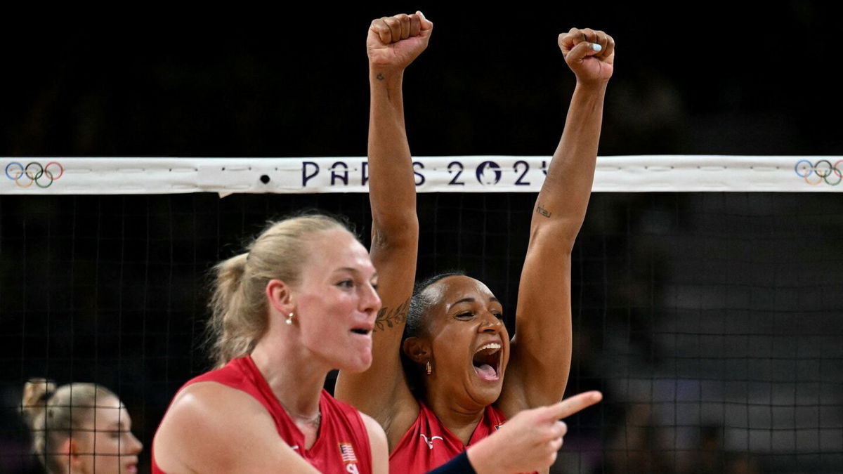 Team USA's Kathryn Plummer and Haleigh Washington celebrate during the volleyball women's quarter-final match between USA and Poland