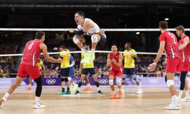 Erik Shoji of the United States celebrates a point against Brazil during a Men's Quarterfinal match