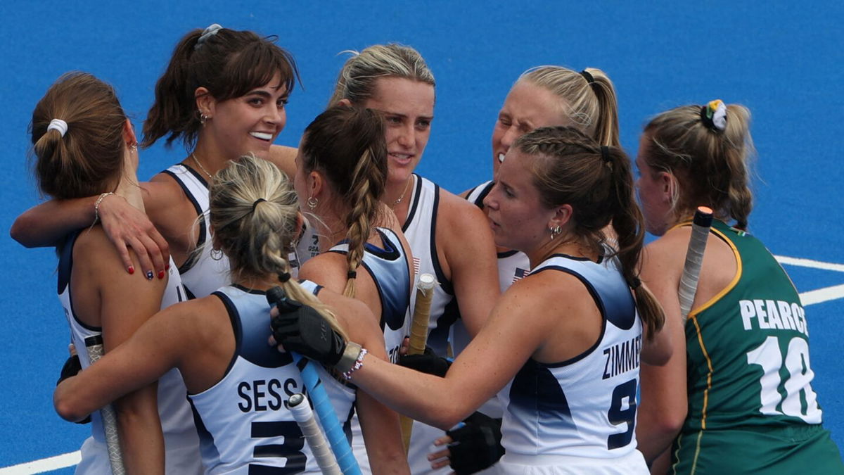 U.S. midfielder #02 Meredith Sholder (2nd-L) celebrates with teammates after scoring their first goal in the women's Pool B field hockey match between the USA and South Africa during the Paris 2024 Olympic Games at the Yves-du-Manoir Stadium in Colombes on August 3