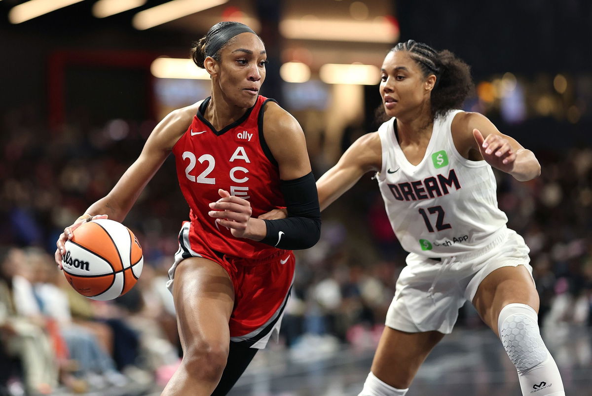 <i>Kevin C. Cox/Getty Images via CNN Newsource</i><br/>A'ja Wilson (#22) of the Las Vegas Aces drives against Nia Coffey (#12) of the Atlanta Dream during the second quarter at Gateway Center Arena on August 27